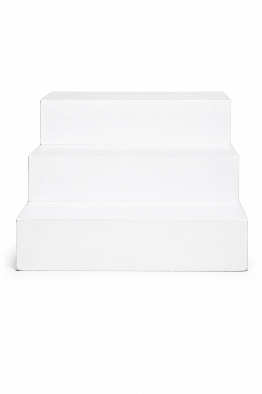 White stepped display risers available as studio props