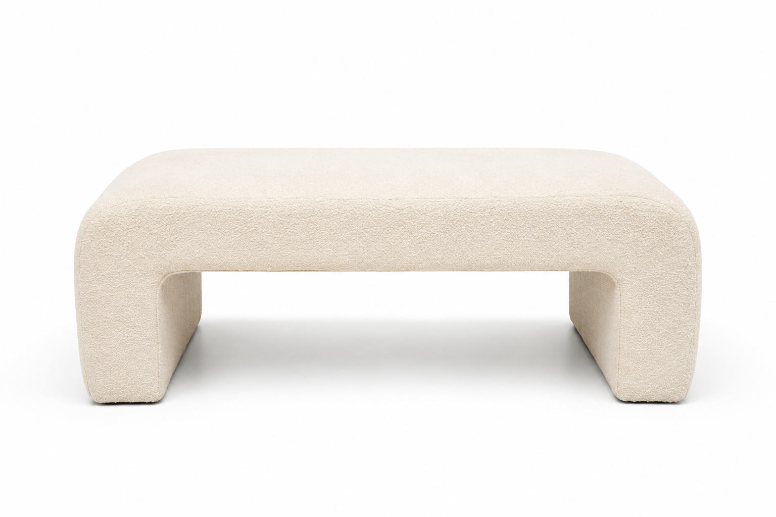Cream upholstered studio bench available for rental